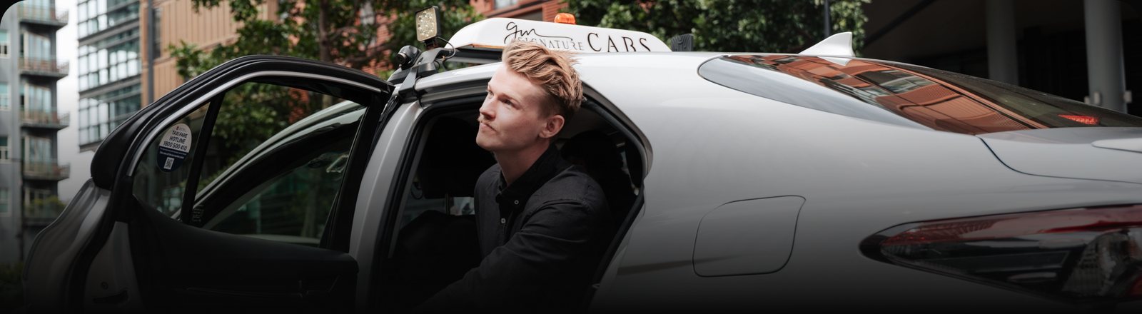 Rydo customer getting out of a taxi